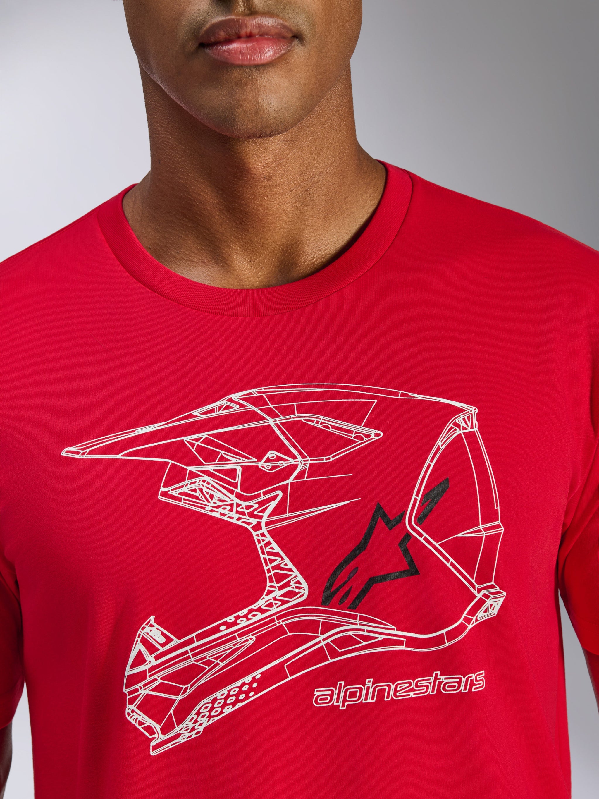 Alpinestars CSF Tee, T-shirt met korte mouwen, rood, witte line-art grafische afbeelding van een motorcrosshelm met zwart sterlogo, casual motorsport streetwear