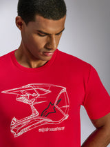 Alpinestars CSF Tee, T-shirt met korte mouwen, rood, witte MX-helm contourgraphic met zwart sterlogo en merknaam, gedragen door een man, casual motorsport streetwear