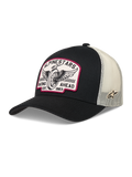 Alpinestars Heritage Patch Trucker hoed, zwarte truckerpet met wit gaas en een vintage racing logo patch.