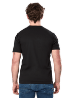 Alpinestars Cereal CSF Tee, T-shirt met korte mouwen, zwart, achteraanzicht, gedragen met blauwe jeans, casual motorsport-geïnspireerde streetwear