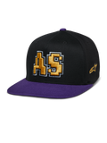 Alpinestars Franchise Pet, pet met platte klep, zwart en paars, goud 3D-geborduurd AS-logo met witte omlijning, paarse klep en topknop, gestructureerd Flex Fit-ontwerp