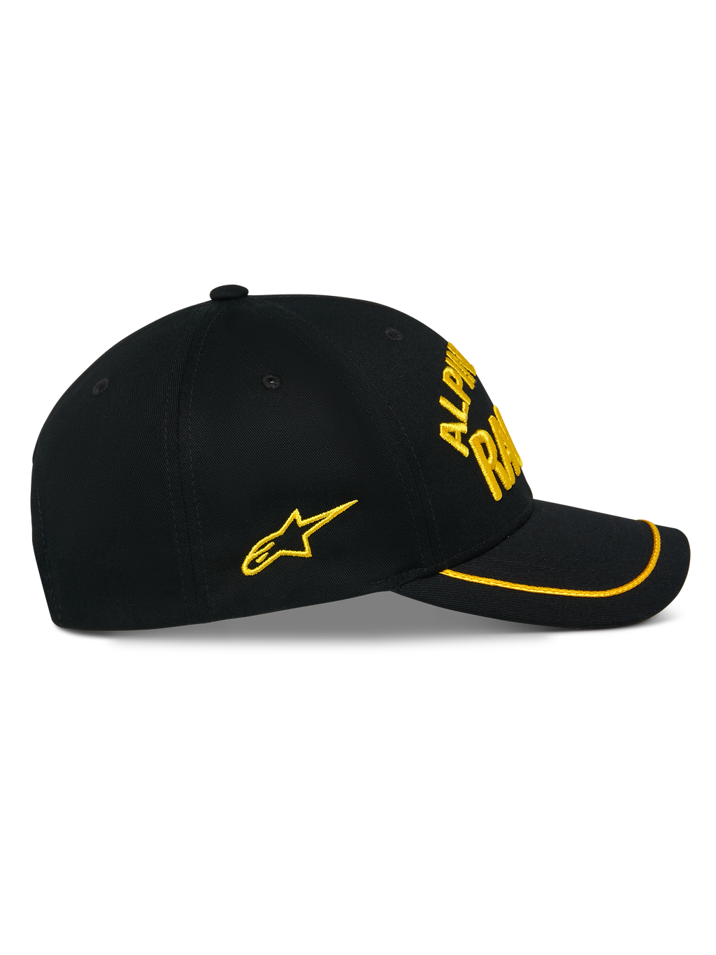 Alpinestars Luminary pet, zwarte snapback cap, zijaanzicht, gebogen klep met gele sutache rand, geel 3D-geborduurd logo en ster aan de zijkant, 100% katoenen keperstof, casual motorsport-geïnspireerde hoofdbedekking