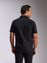 Alpinestars Strive Woven Shirt, Black Short Sleeve Button-Down, Rear view showing back yoke and tailored fit, casual motorsport-inspired streetwear