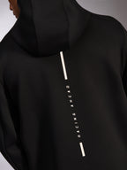 Alpinestars Insight Hoodie, casual sportswear hoodie, black, back view with vertical white Racing Ahead stripe logo, smooth tri-blend double face fleece, modern motorsport-inspired design