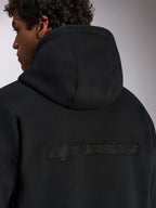 Alpinestars Emergent Oversized Hoodie, black casual streetwear, back view featuring 3D embroidered Alpinestars word logo, oversized fit with premium fleece texture