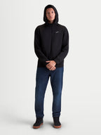 Alpinestars Cypher hoodie, heren-sportswear hoodie met rits, zwart, tri-blend dubbele fleece met een hoge capuchon met mesh-voering en een klein wit Astars-logo op de borst, gedragen door een model voor casual kleding.