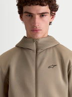 Alpinestars Cypher Hoodie, Sportswear Full-Zip Fleece for Men and Women, Putty Beige, featuring a high-neck hood, technical tri-blend double-face fabric, and a minimalist Alpinestars logo on the chest.