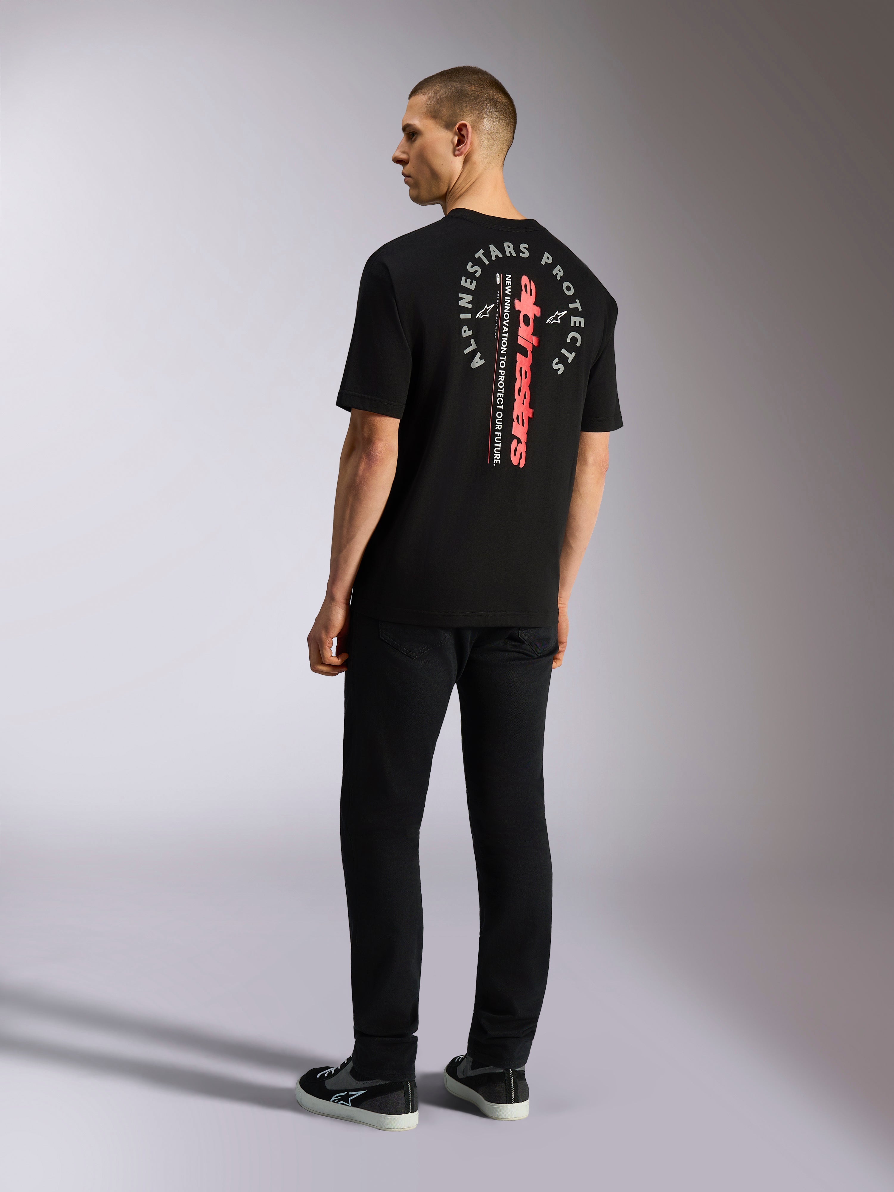 Alpinestars Overhang Oversized CSF Tee, Short Sleeve T-Shirt, Black, featuring vertical red wordmark and circular white graphic on back, casual motorsport streetwear
