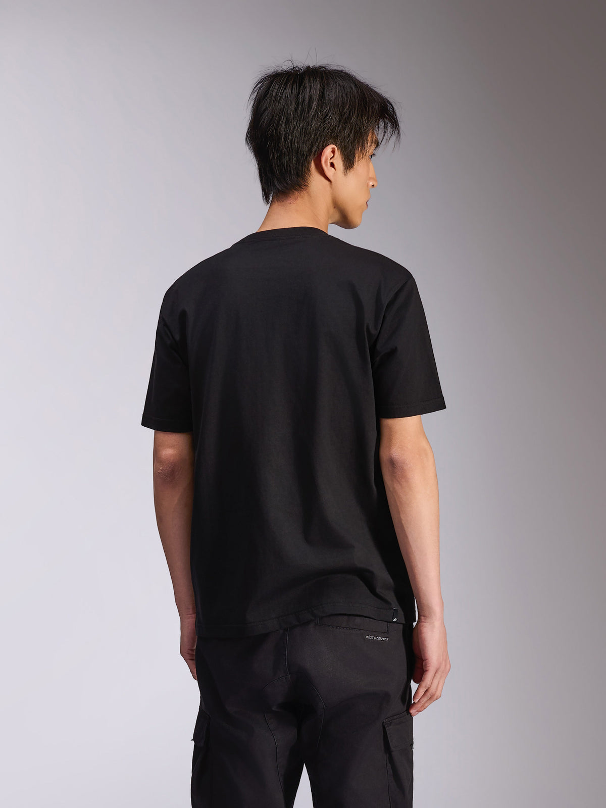 Alpinestars Noka CSF Tee, T-shirt met korte mouwen, zwart, achteraanzicht, casual motorsport-geïnspireerde streetwear