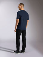 Alpinestars Noka CSF Tee, Short Sleeve T-Shirt, Navy Blue, back view shown on model wearing black pants and sneakers, casual motorsport streetwear