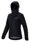 Alpinestars Stella A-Dura Elite waterdichte jas, mountainbikejas voor dames, zwart, voorzien van een ontwerp met capuchon en beschermende stormflap, ritssluiting aan de voorzijde, steekzakken met rits en verstelbare manchetten met klittenband, technisch waterdicht materiaal met een zilverkleurig logo op de borst
