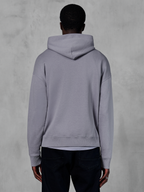 Alpinestars Essentials Ageless Hoodie, silver grey fleece, back view, featuring a minimalist pullover design with a hood and ribbed cuffs, casual motorsport-inspired streetwear