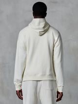 Alpinestars Essentials Ageless Hoodie, off-white pullover hoodie, back view on model, clean minimalist design, matching casual pants, relaxed fit for everyday comfort