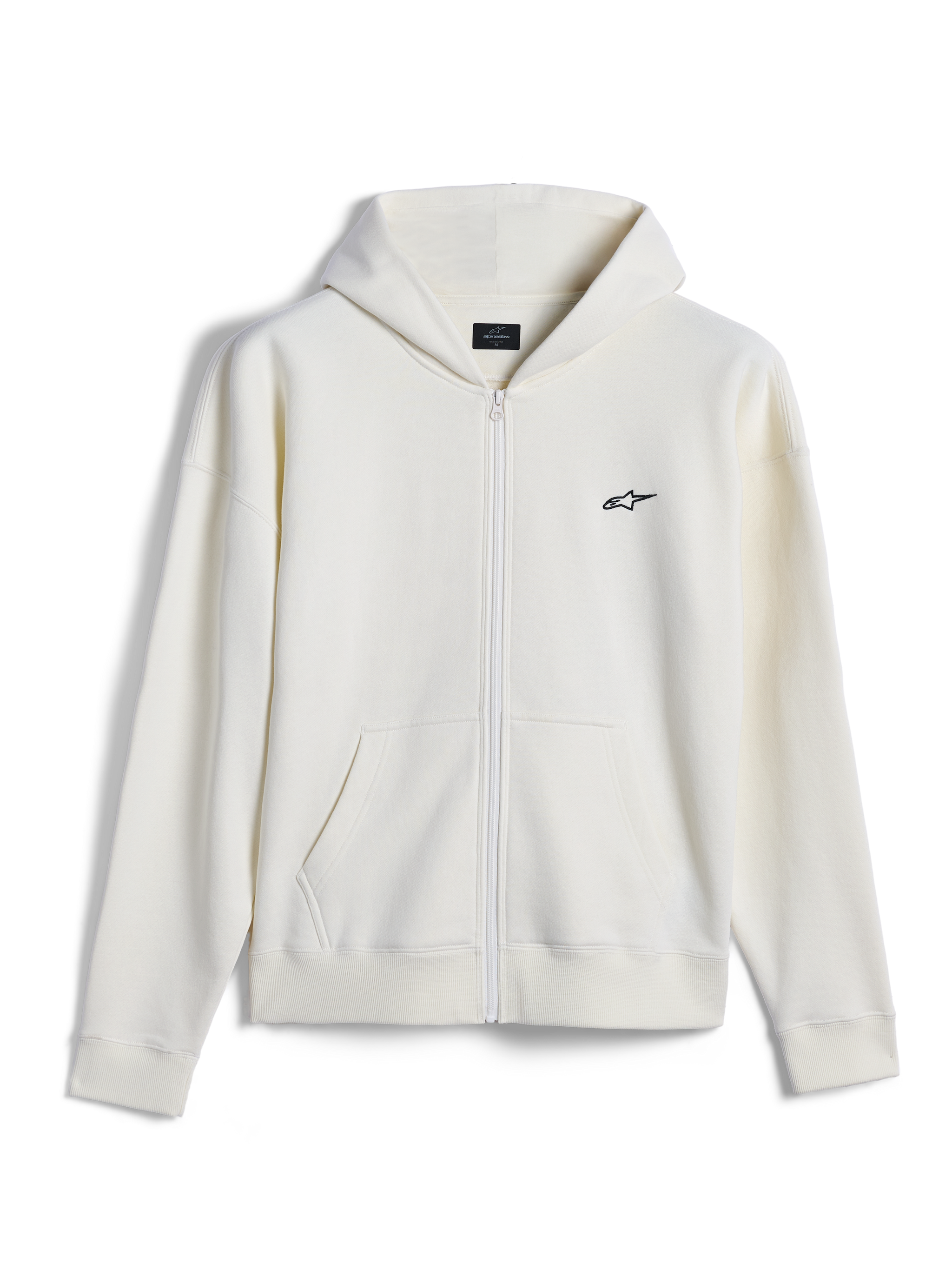 Alpinestars Essentials Ageless Zip Hoodie, casual streetwear, off-white met klein zwart Alpinestars-logo, volledige ritssluiting aan de voorzijde, gedeelde kangoeroezak, ontspannen pasvorm, premium compact fleece-ontwerp