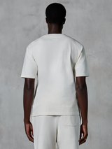 Alpinestars Essentials Ageless SS Tee, T-shirt met korte mouwen, off-white, subtiel Alpinestars-logo, ontspannen pasvorm, premium biologisch katoenen jersey, casual motorsport streetwear