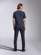 Alpinestars Fasting CSF Tee, T-shirt met korte mouwen, marineblauw, achteraanzicht, gedragen met donkere denim jeans, casual motorsport streetwear
