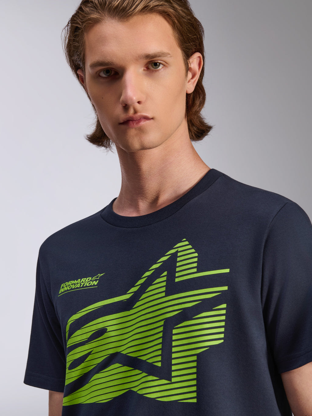 Alpinestars Fasting CSF Tee, t-shirt met korte mouwen, marineblauw, limoengroene geometrische ster-graphic met Forward Innovation tekst, casual motorsport streetwear