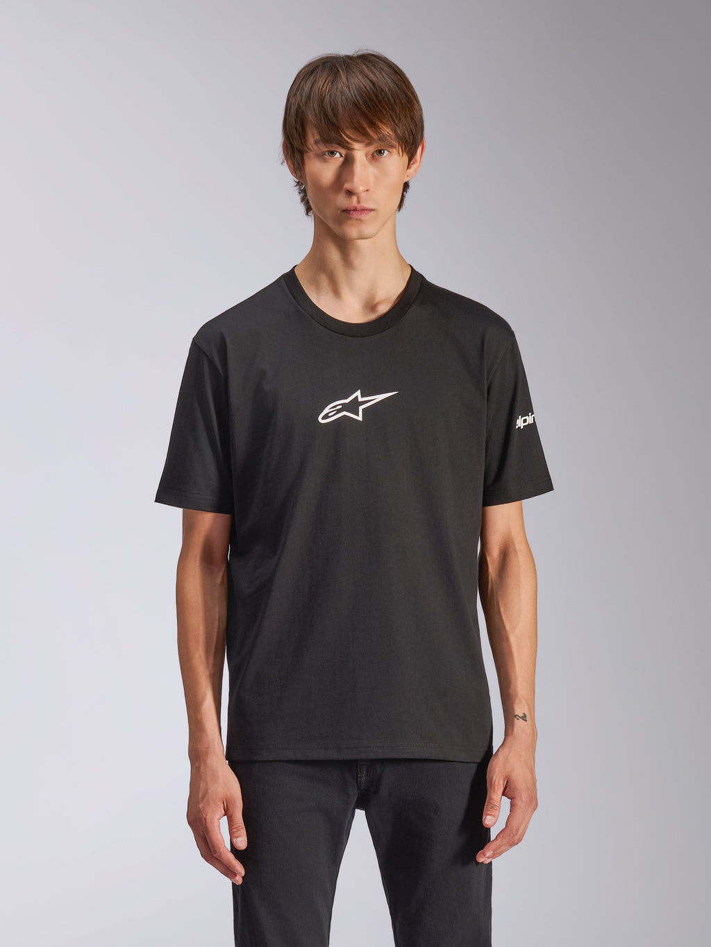Alpinestars Frontal CSF Tee, Short Sleeve T-Shirt, Black, white Astars logo on chest, worn by model, casual motorsport apparel