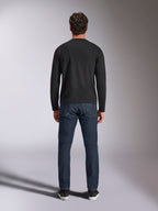 Alpinestars Trackside CSF Tee, Long Sleeve T-Shirt, Black, back view on a model wearing dark blue denim jeans, casual motorsport streetwear