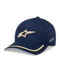 Alpinestars Ascension Snapback pet, baseballcap, donkerblauw en goud, 3D-geborduurd Astars-logo, gebogen klep met gele en witte strepen, casual motorsport-headwear