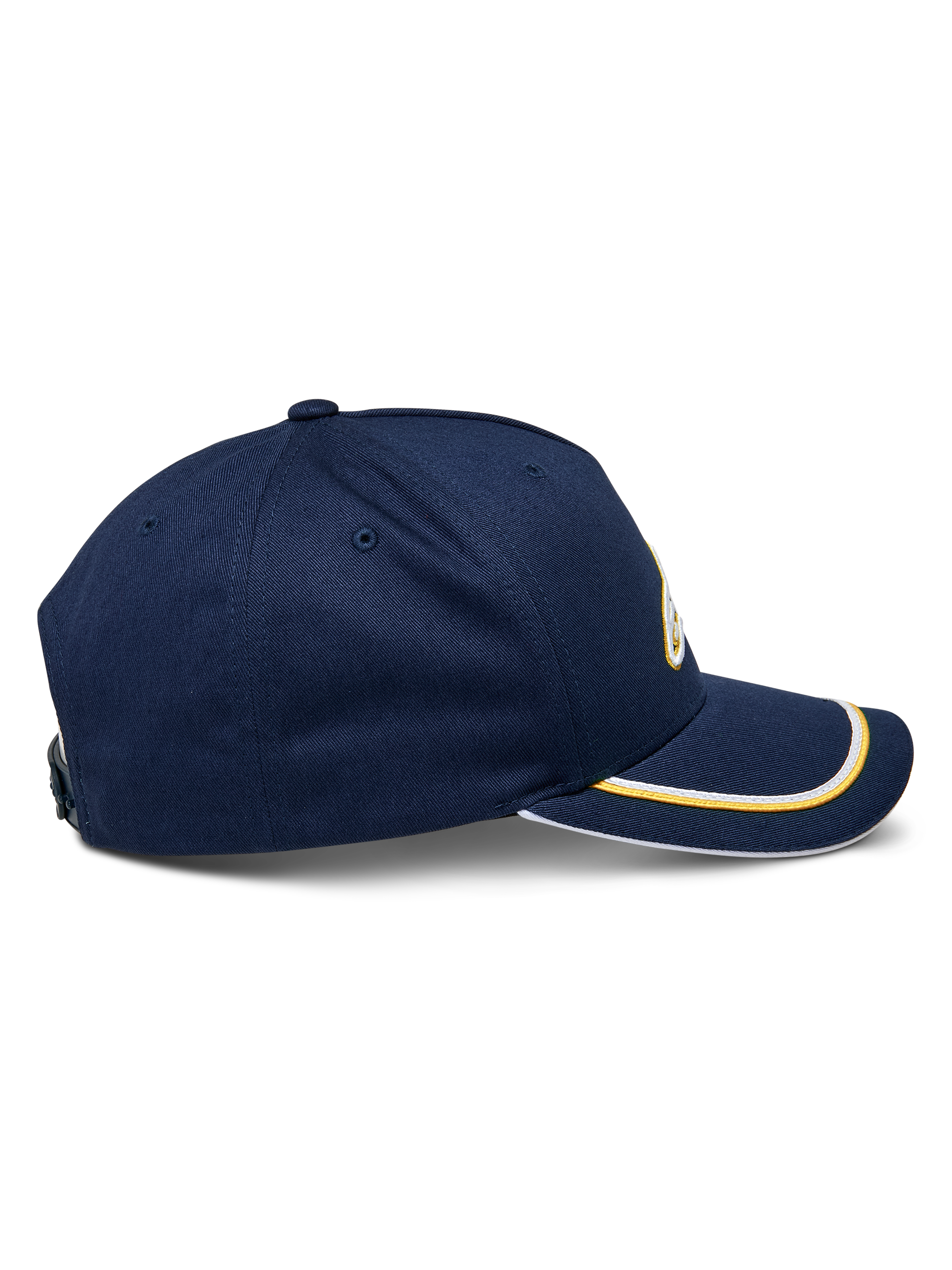 Alpinestars Ascension Snapback pet, zijaanzicht, marineblauw met goudkleurige en witte sutache-afwerking op de gebogen klep, gestructureerde kroon, casual motorsport hoofddeksel