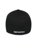 Alpinestars Corp Shift Multi pet, zwart, achteraanzicht met wit plat geborduurd logo aan de basis, flexibele stretch-fit constructie, casual motorsport-geïnspireerde pet