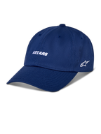 Alpinestars Deduce Strapback pet, blauwe baseballcap met wit geborduurd ASTARS-woordmerk en sterlogo aan de zijkant, gebogen klep, casual motorsport streetwear