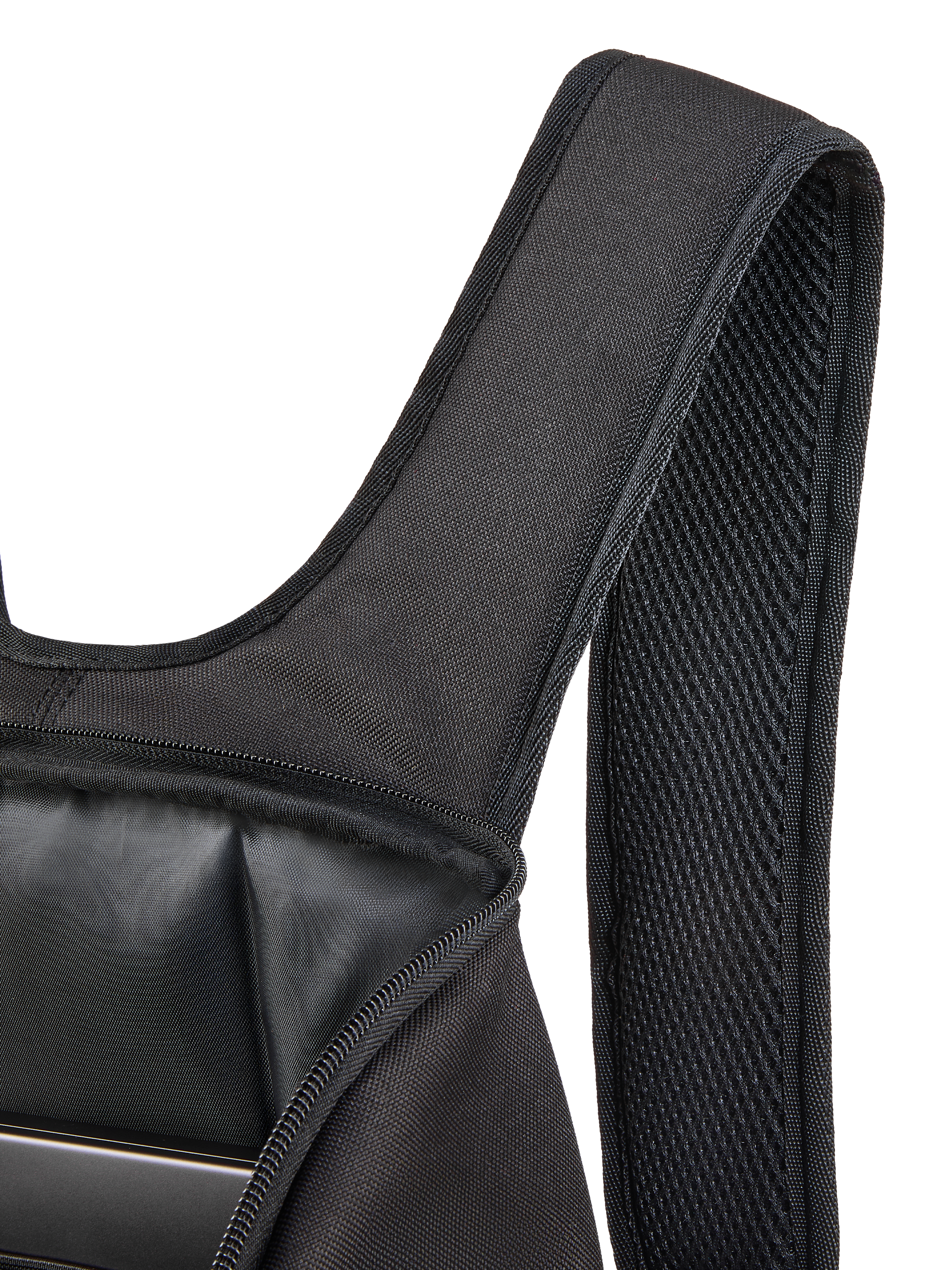 Alpinestars Defcon V3 Backpack, close-up of the padded air mesh shoulder strap and open main compartment, black 600D polyester, showing internal laptop sleeve and durable textile construction.