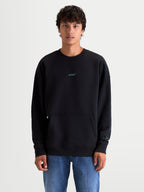 Alpinestars Guise Oversized Crew, zwarte sportswear trui, heren, oversized pasvorm met kangoeroezak, blauwgroen geborduurde Astars-logo's, katoen en gerecycled polyester fleece.