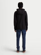 Alpinestars Camino Textured Oversized Hoodie in Black, Premium Sportswear Pullover with Textured Knit Twill Fleece, Rear View on Model, Relaxed Fit Lifestyle Apparel.