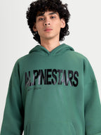 Alpinestars Shaw oversized hoodie, groene sportswear-pullover voor heren, met een groot zwart getextureerd Alpinestars woordlogo op de borst, oversized pasvorm en zachte fleececonstructie.