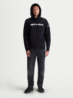 Alpinestars Race Wordmark hoodie, casual sportswear pullover fleece voor heren en dames, zwart en wit, katoenmix, met het Race Linear woordlogo op de borst en Ageless-logo op de mouw, voorzien van kangoeroezak en verstelbare capuchon.