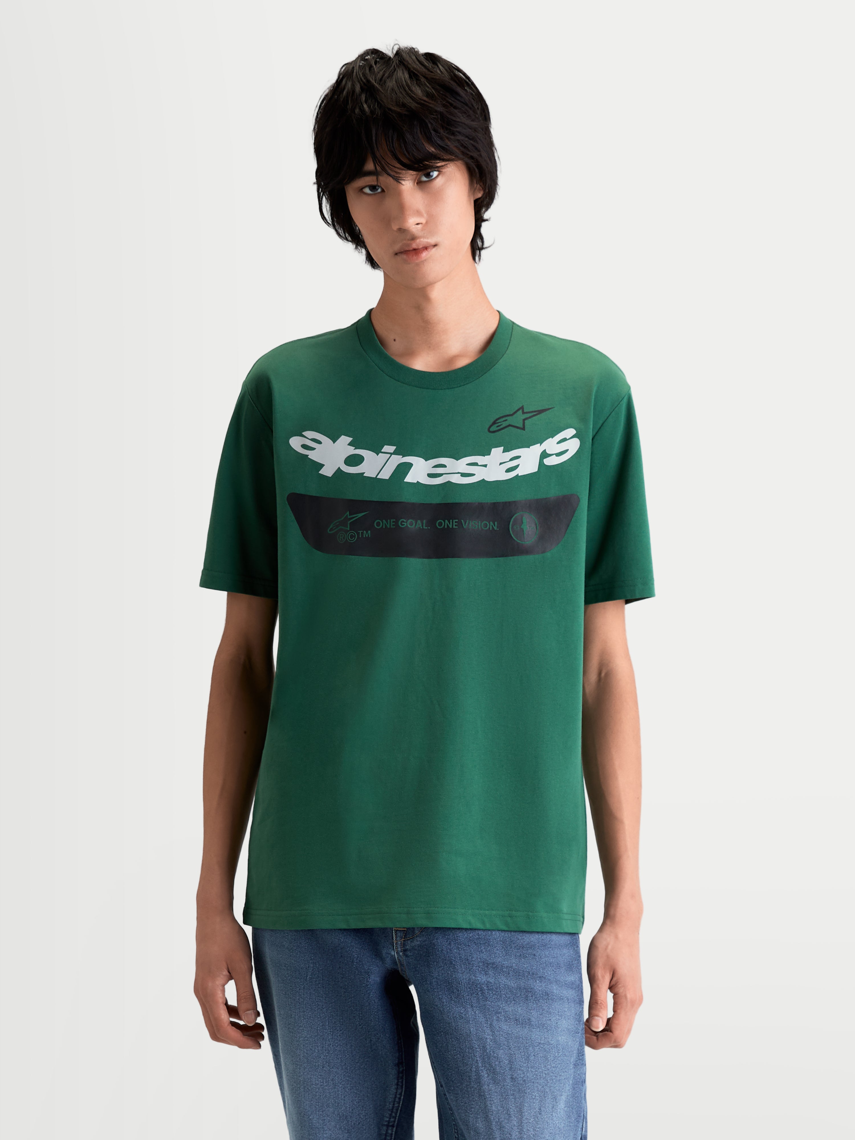 Alpinestars Singular CSF Tee, Short Sleeve Sportswear T-Shirt on model, Green with white Alpinestars curved wordmark and black chest graphic, casual motorsport-inspired cotton-poly top.