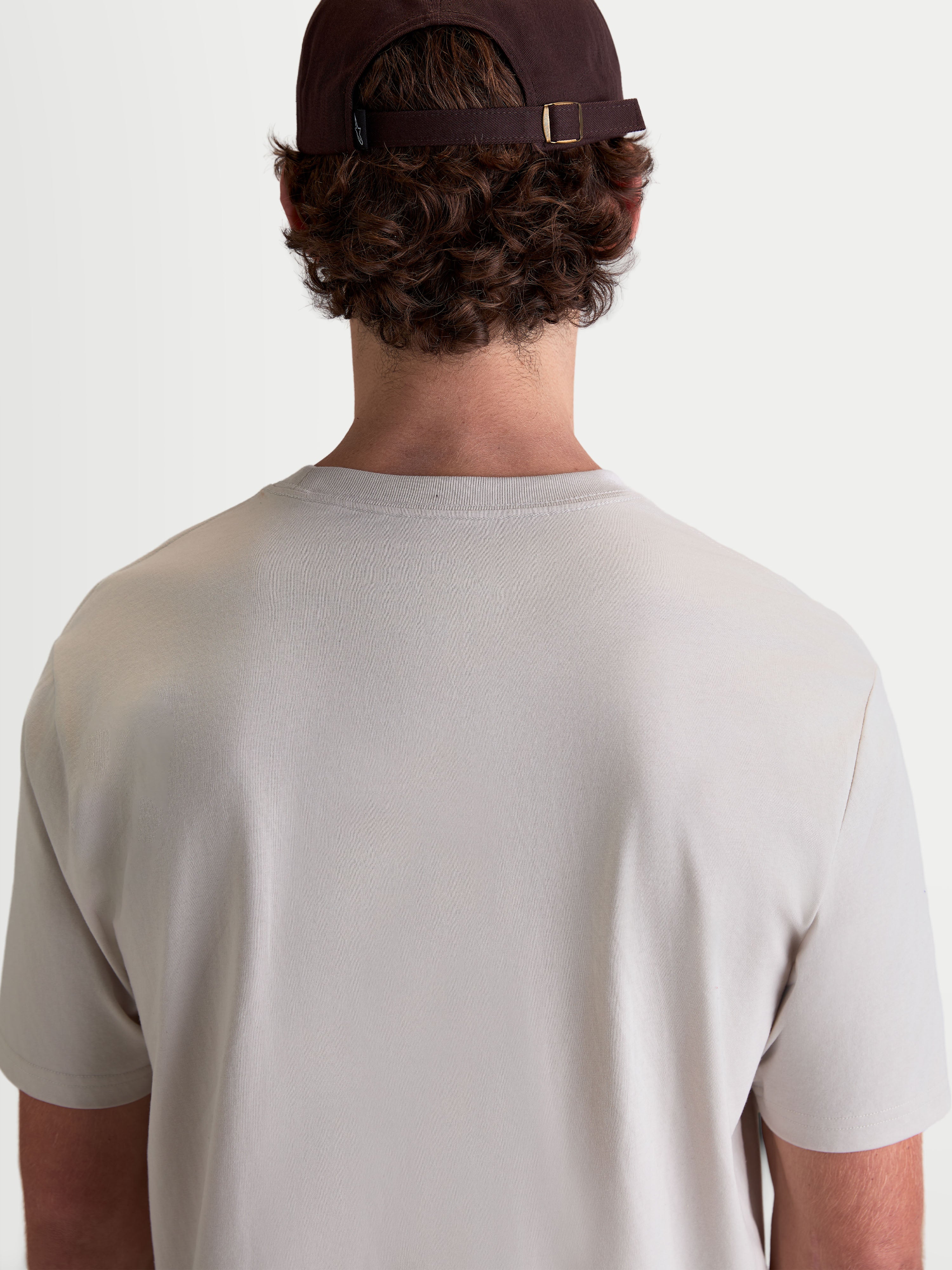 Alpinestars Elliptogrit CSF T-Shirt, sportswear-t-shirt met korte mouwen, grijs, achteraanzicht van model in een premium katoen-polyestermix voor dagelijkse casual lifestylekleding.