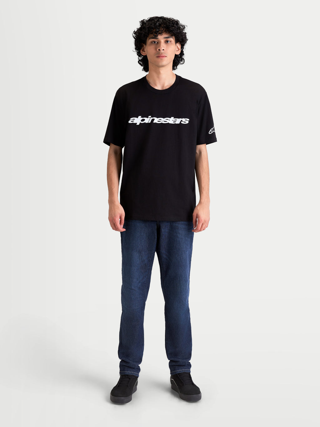 Alpinestars Race Wordmark CSF Tee, Casual Sportswear Short Sleeve T-Shirt, Black and White, featuring a front Alpinestars wordmark and sleeve Ageless logo, on-model front view.