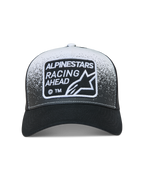 Alpinestars Gravel Trucker pet, zwart en wit met mesh achterkant, grindtextuur print en geweven label.