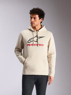 Alpinestars Always V3 Hoodie, casual sportkleding, off-white met zwart sterlogo en rode branding, capuchon met trekkoord, kangoeroezak aan de voorkant, gedragen door model met donkere broek, modern op de motorsport geïnspireerd ontwerp