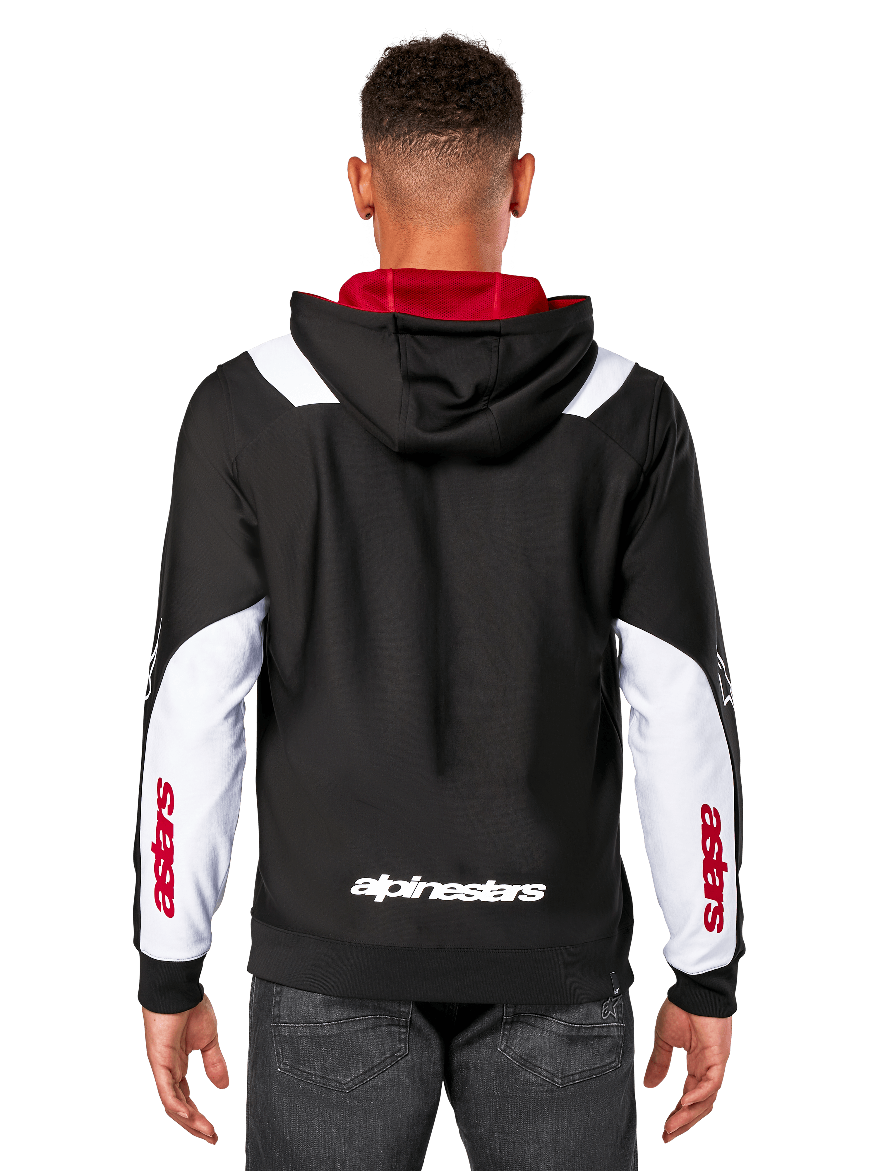Alpinestars Sessions V3 Hoodie, achteraanzicht, zwart met witte mouwpanelen en rode capuchonvoering, voorzien van wit woordmerk op de rug en rode branding op de mouwen, casual streetwear geïnspireerd op de motorsport