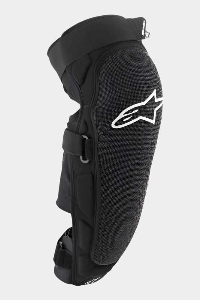 Alpinestars Vector Pro knie-/scheenbeschermer, zwart, met een wit Alpinestars-logo op de knie, getextureerd slijtvast voorpaneel, verstelbare klittenbandbanden, ademende MTB-bescherming