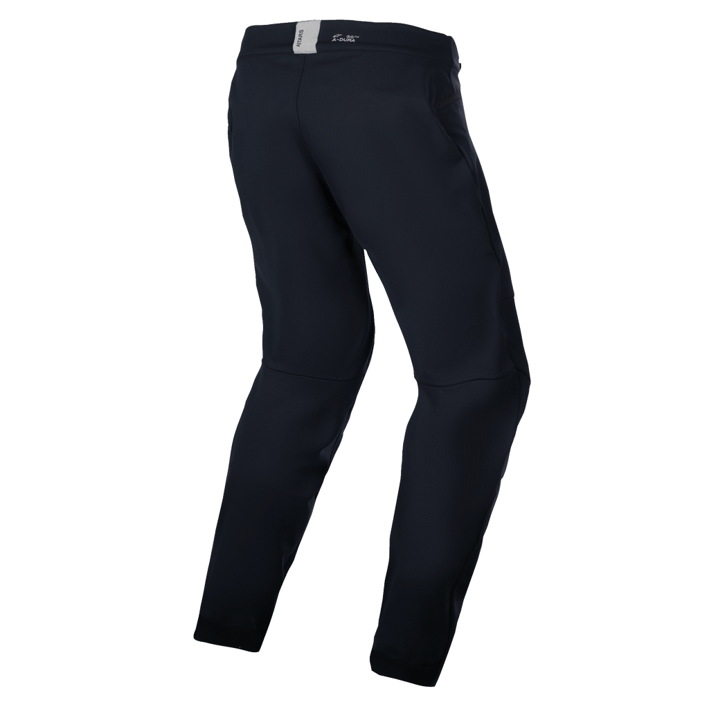 Alpinestars A-Dura Thermal Pant, mountainbikebroek, zwart, achteraanzicht met een voorgevormd anatomisch ontwerp, klein ASTARS-logo op de achterkant van de tailleband, minimalistische stijl voor trail- en enduro-rijden