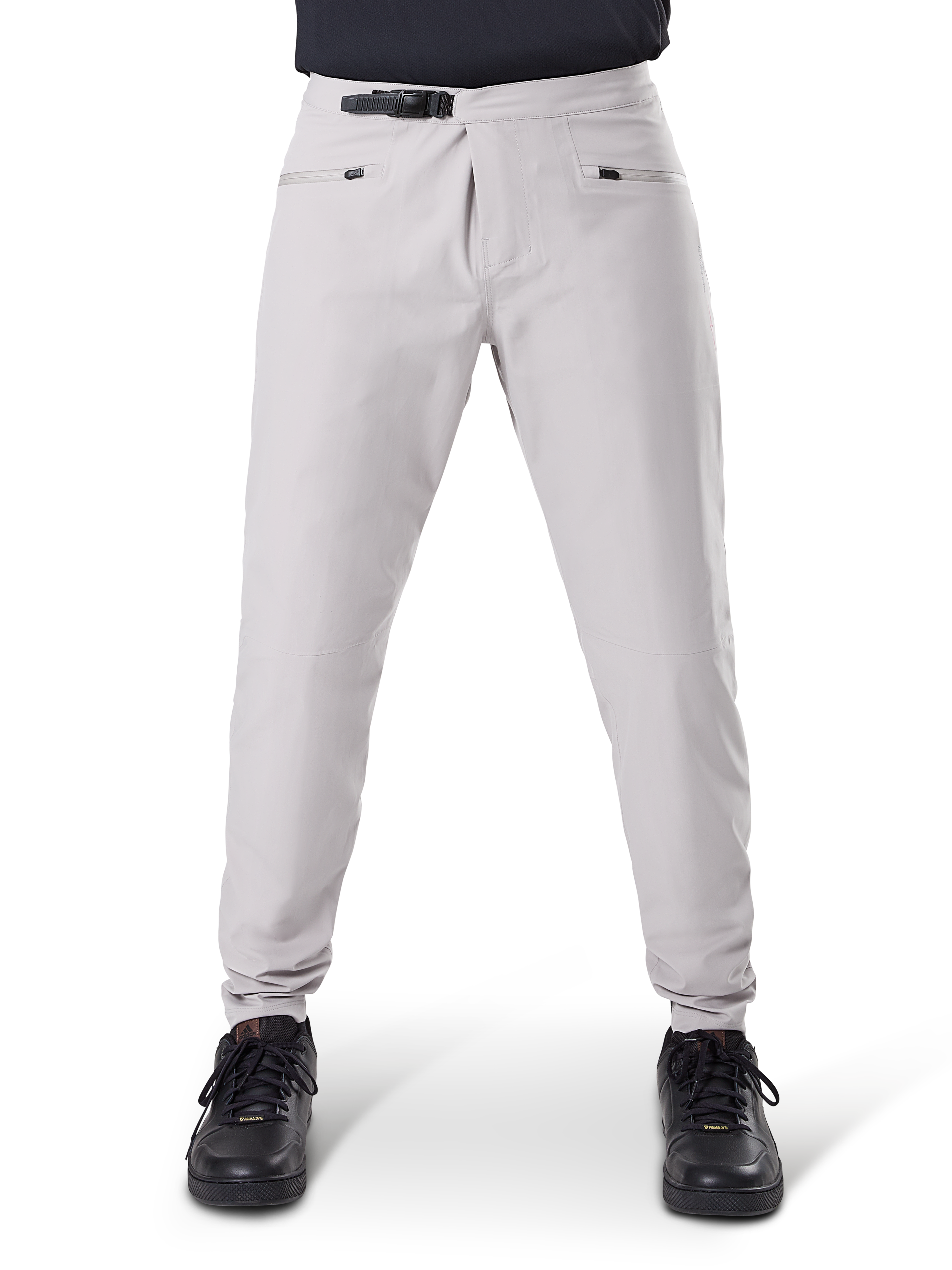 Alpinestars A-Dura Waterproof Pants, MTB Cycling Pants, Titanium Gray, front view, featuring a black ratchet waist closure and dual zippered pockets, elasticated cuffs, worn with black sneakers, technical waterproof gear for mountain biking