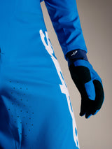 A-Supra Elite Broek in Faded Bright Blue met laserperforaties en wit Astars-woordmerk op premium stretchstof.