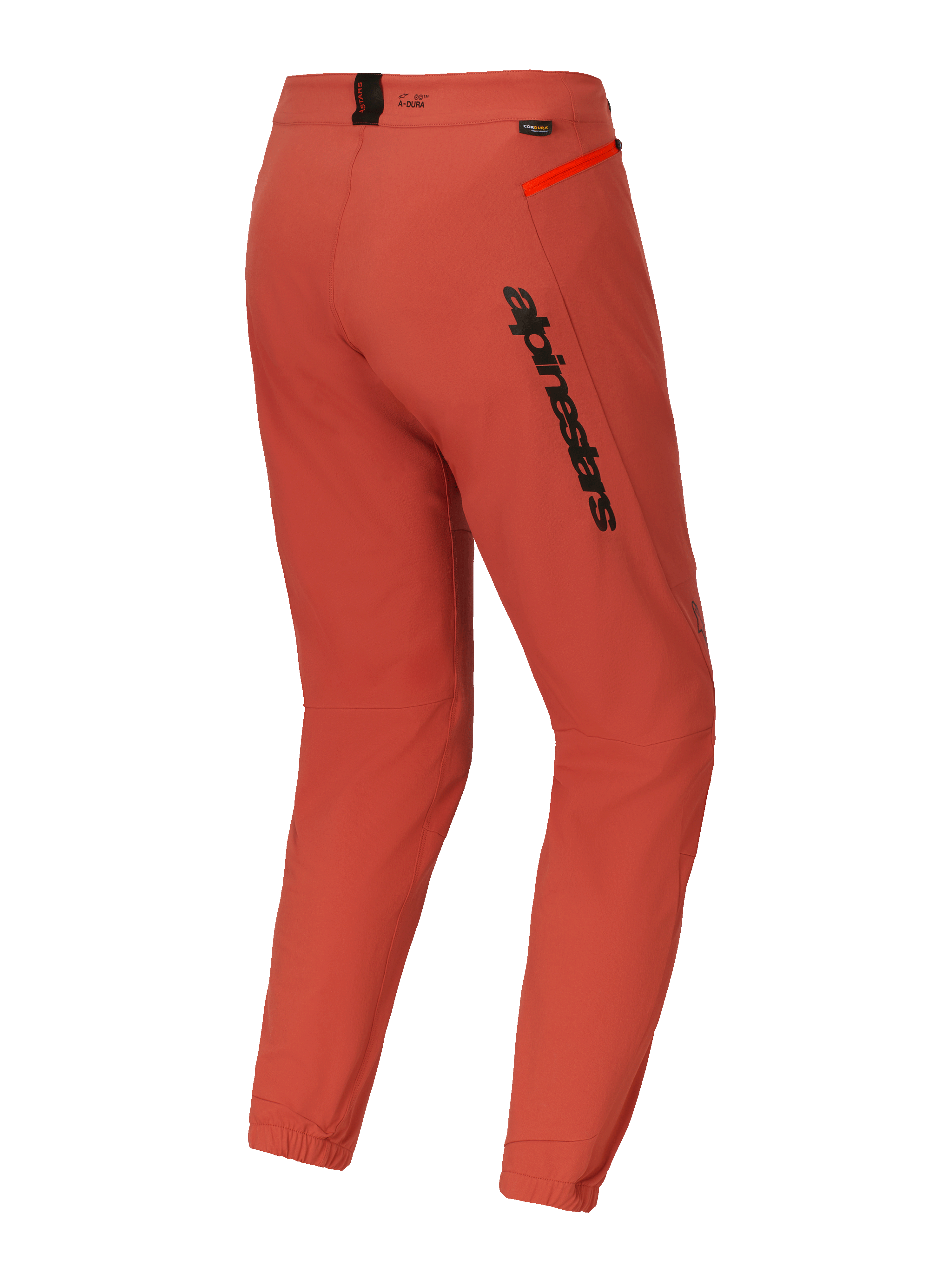Alpinestars A-Dura Elite broek, mountainbike (MTB) broek, donkeroranje, driekwart achteraanzicht met opvallende zwarte Alpinestars-branding op de dij, feloranje ritsaccent op de heup en elastische enkelmanchetten, technische performance wielerkleding