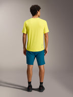 Gele A-Dura Ride SS Jersey en blauwgroene shorts, achteraanzicht van MTB-prestatiekleding.