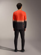 A-Dura ASTARS Jersey 2.0 mountainbikeshirt, achterzijde, lange mouwen met oranje en zwart kleurverloop.