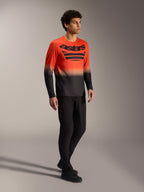 Oranje-zwart A-Dura ASTARS 2.0 fietsshirt met lange mouwen, opvallend borstlogo en technisch ontwerp voor MTB.