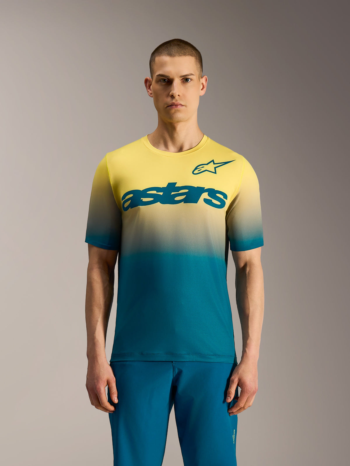 A-Dura ASTARS Jersey 2.0 MTB-shirt met korte mouwen, blauwgroen naar geel fluo kleurverloop en opvallend borstlogo.