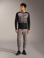 Alpinestars A-Dura Elite Jersey 2.0, zwart en grijs MTB-shirt met lange mouwen, borstlogo en streepdetails.