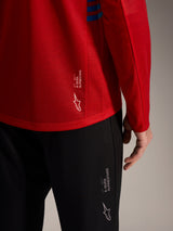 Rode A-Dura Elite 2.0 jersey met lange mouwen en zwarte MTB-broek met Alpinestars-logo's en technische stof.