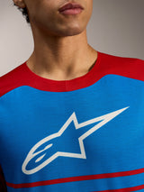 Alpinestars A-Dura Elite Jersey 2.0, blauw-rood geblokte MTB-trui met een opvallend wit sterlogo op de borst.